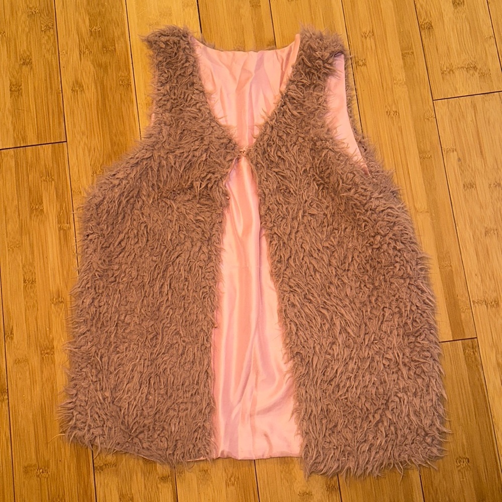 Women’s pink furry vest
